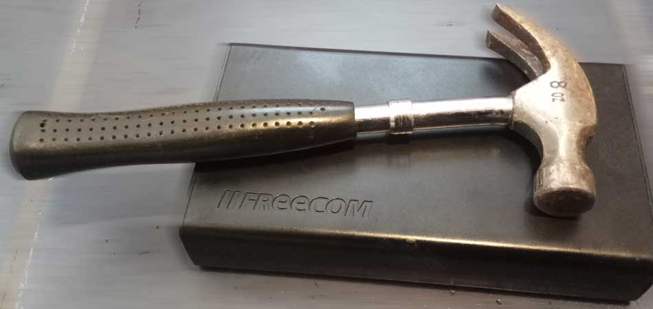 Shucking a Freecom external hard drive using a hammer