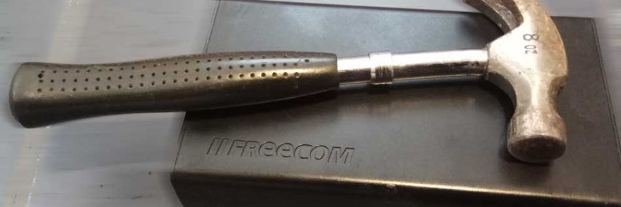Shucking a Freecom external hard drive using a hammer